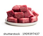 Fresh  raw beef in ceramic plate isolated on white 