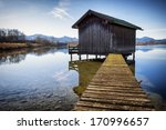 Old Wooden Hut At A Lake