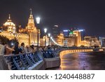 Beautiful night view of the Bund (Waitan) at downtown of Shanghai, China. The embankment of the Huangpu River is a popular tourist attraction of Asia.