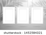 three white blank paintings... | Shutterstock .eps vector #1452584321