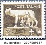 Small photo of Italy - circa 1943: a postage stamp from Italy showing the roman she-wolf with romulus and remus