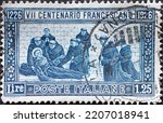 Small photo of ITALY - CIRCA 1926: a postage stamp from ITALY , showing a group of monks at the deathbed of St. Francis of Assisi . Circa 1926