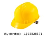 Yellow hard hat for construction workers. Protective clothing and accessories for employees. Light background.
