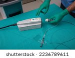 Small photo of Optical coherence tomography (OCT). Purge catheter with contrast. Intravenous Administration of Contrast Agents for Enhanced CT or MR Scans. Heart catheterization instrument for heart surgery.