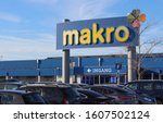 Small photo of GHENT, BELGIUM, 6 JANUARY 2020: Exterior view of a Makro store in Eke near Ghent in Belgium. Makro is an international brand of warehouse clubs, also called cash and carries. Illustrative editorial.