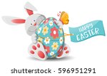 easter bunny and easter egg | Shutterstock .eps vector #596951291