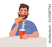 Man Is Eating Fast Food. The...