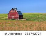 Red Barn On Green Field With...