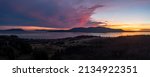 Small photo of Fiery Sunset Over Orcas Island, Washington. Aerial shot taken from Lummi island looking across Rosario Strait in the Salish Sea area of western Washington state.