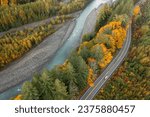 Aerial view along the Mt. Baker Highway of the Nooksack River during the fall season. Towering evergreens and leaf maples line the route of SR542 from Bellingham to Artisst Point and Heather Meadows.