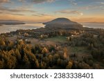 Small photo of Aerial sunset view of the south end of Lummi Island, Washington. Fall color dominates the landscape on this rural island in the Salish Sea area of the Pacific Northwest.