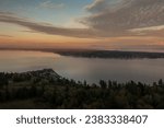 Small photo of Aerial view of a sunset over Lane Spit on Lummi Island, Washington. Separated by Hale Pass from the mainland this small island is a destination for visitors who want a quiet, peaceful getaway.