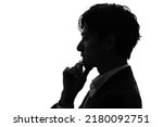 Silhouette of thinking asian...