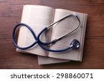 Stethoscope On Books On Wooden...