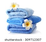 Stack of colorful towels isolated on white