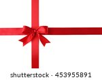 red ribbon with bow knot on... | Shutterstock . vector #453955891