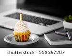 Tasty cupcake on working place
