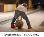 Cute Child With Ball In Bowling ...