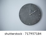 Big Clock Hanging On Grey Wall