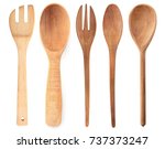 Wooden cooking utensils on white background