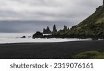 Small photo of Stunning landscape with basalt rock formations Troll Toes on Black beach Reynisfjara near the village of Vik i myrdal. Reynisfjara Beach, Vik Village, Iceland (Sudurland), Europe
