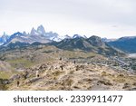 Small photo of There are many people at the Mirador de los Condores looking at the Fitz Roy mountain in El Chalten.