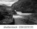 Small photo of Clack and white view of river cascading down Petrohue Falls by the Osorno volcano in Chile