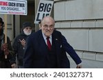 Small photo of WASHINGTON, DC - December 15, 2023: Former New York mayor Rudy Giuliani leaves the courthouse after a jury awarded 2 former Atlanta poll workers $148 million for defamation.