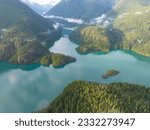 Small photo of Rugged, forest-covered slopes surround Diablo Lake in North Cascades National Park. This mountainous region of northern Washington is absolutely beautiful and easily accessed during summer months.