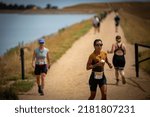 Small photo of BOULDER, COLORADO – JULY 23, 2022: Larissa Fabrini runs to a win in the Beast long-course women's race at the Tri Boulder Triathlon.