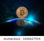 Closeup Bitcoins mockup with reflection over the Part of earth with sun rise and lens flare over the Milky Way background, cryptocurrency high risk concept, Elements of this image furnished by NASA