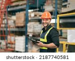 Small photo of Professional manager man employee using tablet check stock working at warehouse. Worker wearing high visibility clothing and a hard hat, helmet and checking and count up goods or boxes for delivery.