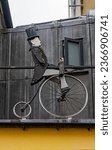 Small photo of Oxford, Oxfordshire, UK, September 20th, 2023, penny farthing bike used for display purposes above the bike repair shop.