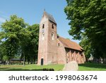 Medieval roman Saint-Margaretha church on the green in the village Norg in the province Drenthe