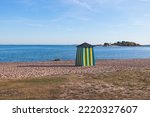 View of Hanko town coast, Hango, Finland, with beach and coastal waterfront, wooden houses and beach changing cabins, Uusimaa, Hanko Peninsula, Raseborg sub-region, summer sunny day 