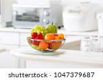 Fruit basket in bright kitchen