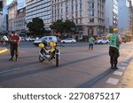 Small photo of Buenos Aires, Argentina; March 3, 2023: Traffic and police officers closing a street and diverting vehicle traffic while a peaceful protest is taking place.