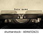 Fake news words typed on vintage typewriter.