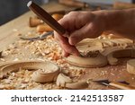 Small photo of Carpenter wood carving equipment. Woodworking, craftsmanship and handwork concept. Wood processing. Joinery work Wood carving Chisels for carving on the woodworker desk Timber Joinery work.