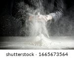 Small photo of Rece with flour working in the kitchen on a wooden board in the morning mood light