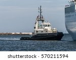 Tugboat Pushing A Cruise Ship...