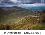 Small photo of High Cup Nick is a classic U-shaped valley high on the western flanks of the North Pennines Area of Outstanding Natural Beauty. A deep chasm on the Pennine fellside, this famous nick, a dra