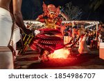 Small photo of Payyanur, India - December 4, 2019: Theyyam artist perform with fire during temple festival in Payyanur, Kerala, India. Theyyam is a popular ritual form of worship in Kerala, India