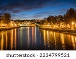 Tavira town on the Rio Gilao river at night, Algarve region, Portugal. Popular tourist destionation in Southern Portugal