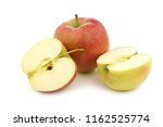 Small photo of fresh Maribelle apple and a cut one on a white background