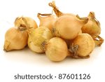 fresh pearl onions on a white background