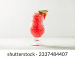 Refreshing cold summer drink watermelon slushie with mint in glass