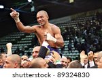 Small photo of FLORENCE, ITALY - NOV 4: "Leonard Bundu" [Boxer] celebrates and points a finger to the fans after winning the match at "European Welter Boxing Title" in Florence, Italy on Nov 4, 2011.