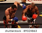 Small photo of FLORENCE, ITALY - NOV 4: "Daniele Petrucci" [Boxer-L] dodges a punch from "Leonard Bundu" [Boxer-R] while fighting at "European Welter Boxing Title" in Florence, Italy on Nov 4, 2011.