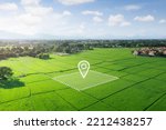 Land plot in aerial view. Identify registration symbol of vacant area for map. That property, real estate for business of home, house or residential i.e. development, sale, rent, buy or investment.